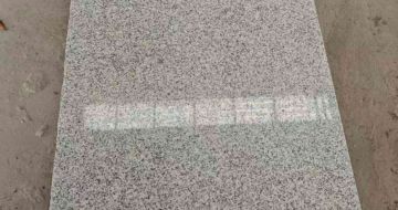 江苏芝麻白光面毛板