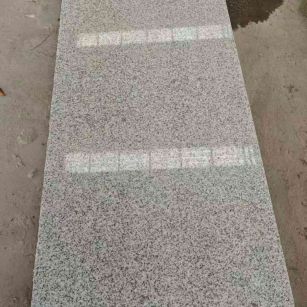 江苏芝麻白光面毛板